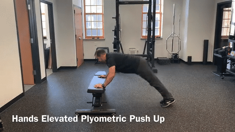 hands elevated plyo push up exercise
